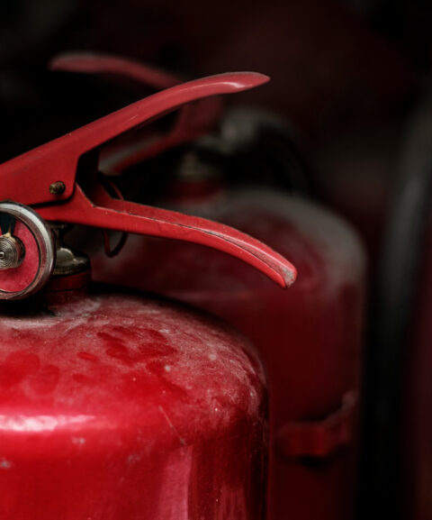 closeup-red-fire-extinguishers